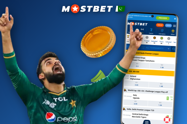 Pakistani player handing rupee notes to a Mostbet cash agent at a local counter